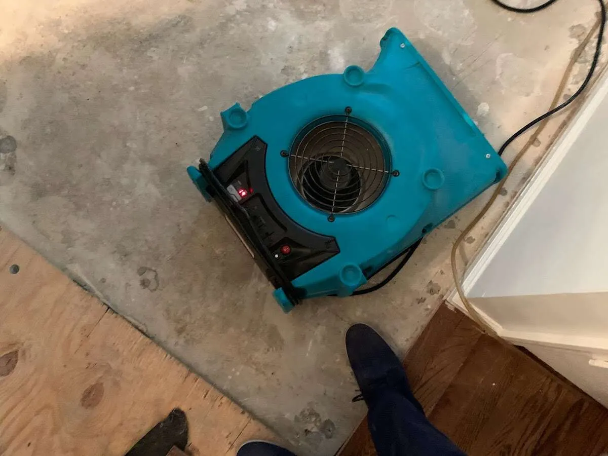 Air mover drying subfloor during Leak Detection & Repair in Lake Elsinore